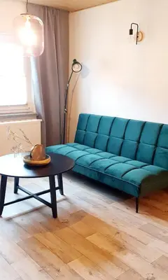 Ein Sitzbereich in der Unterkunft Ferienwohnung Pension Reimann Zwethau