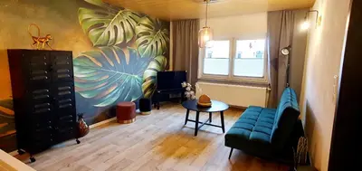Ein Sitzbereich in der Unterkunft Ferienwohnung Pension Reimann Zwethau