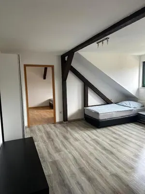 Ein Bett oder Betten in einem Zimmer der Unterkunft FeWo für 4 Personen in Wurzen