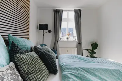 Ein Bett oder Betten in einem Zimmer der Unterkunft Kaßberg Home