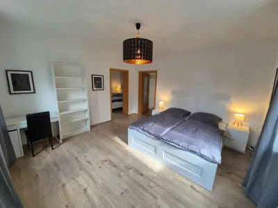Ein Bett oder Betten in einem Zimmer der Unterkunft Villa Waldzauber