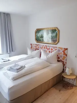 Ein Bett oder Betten in einem Zimmer der Unterkunft Gasthaus Pension Bretthäusl