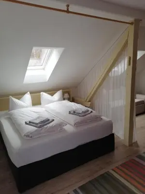 Ein Bett oder Betten in einem Zimmer der Unterkunft Gasthaus Pension Bretthäusl