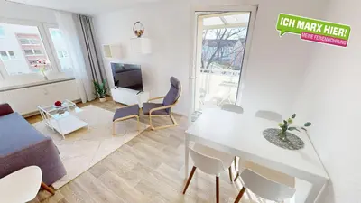 Ein Sitzbereich in der Unterkunft Cozy Apartment with balcony, WLAN