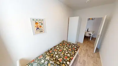 Ein Bett oder Betten in einem Zimmer der Unterkunft 5 Personen Apartment, WLAN
