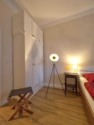 Ein Bett oder Betten in einem Zimmer der Unterkunft Ferienwohnung SchlossGarten