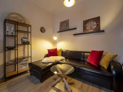 Ein Sitzbereich in der Unterkunft Ferienwohnung SchlossGarten