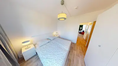 Ein Bett oder Betten in einem Zimmer der Unterkunft Apartment für 5 Personen, WLAN
