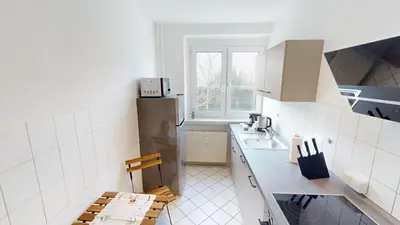 Küche/Küchenzeile in der Unterkunft Moderner Plattenbaucharme mit WLAN