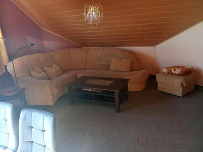 Ein Sitzbereich in der Unterkunft Haus Carmen