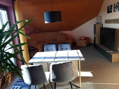 Ein Sitzbereich in der Unterkunft Haus Carmen