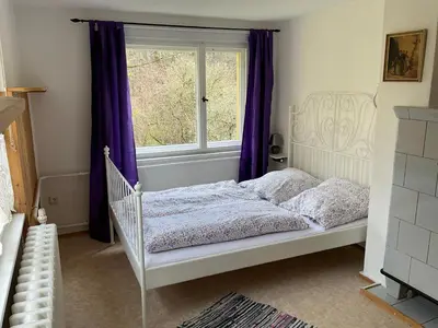 Ein Bett oder Betten in einem Zimmer der Unterkunft Friedland Ferienwohnung