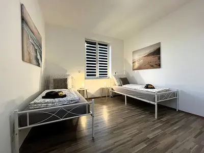 Ein Bett oder Betten in einem Zimmer der Unterkunft MonteurWohnung Oskar06