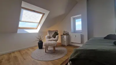 Ein Bett oder Betten in einem Zimmer der Unterkunft Grüne Oase am Küchwald