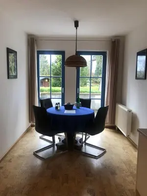 Ein Sitzbereich in der Unterkunft Maison Euba am Zeisigwald