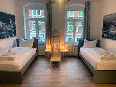 Ein Bett oder Betten in einem Zimmer der Unterkunft 6 Betten am Bahnhof der Kulturhauptstadt 2025