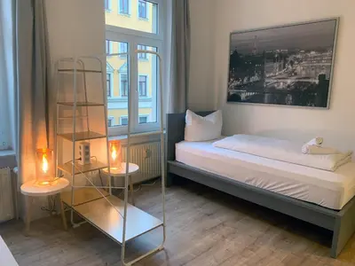 Ein Bett oder Betten in einem Zimmer der Unterkunft 6 Betten am Bahnhof der Kulturhauptstadt 2025
