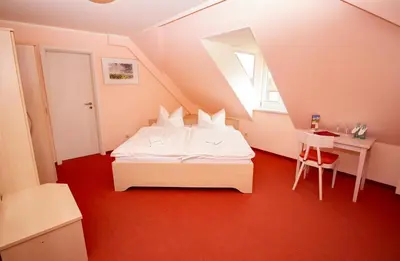 Ein Bett oder Betten in einem Zimmer der Unterkunft Gut Haferkorn GmbH