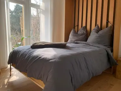 Ein Bett oder Betten in einem Zimmer der Unterkunft Cozy apartment