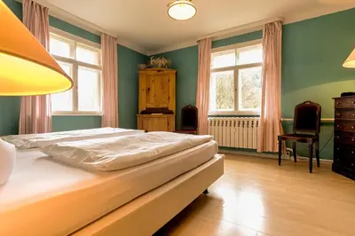 Ein Bett oder Betten in einem Zimmer der Unterkunft Apartment Schrammsteinblick 2
