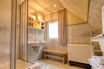 Ein Badezimmer in der Unterkunft Ferienhaus StrandHaus