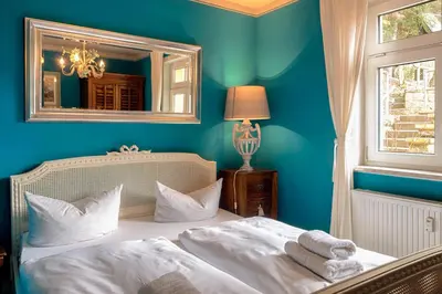 Ein Bett oder Betten in einem Zimmer der Unterkunft Apartment Schrammsteinblick 1