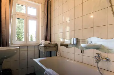Ein Badezimmer in der Unterkunft Apartment Schrammsteinblick 1