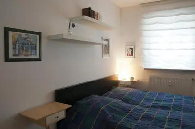 Ein Bett oder Betten in einem Zimmer der Unterkunft Ferienwohnung Henninger
