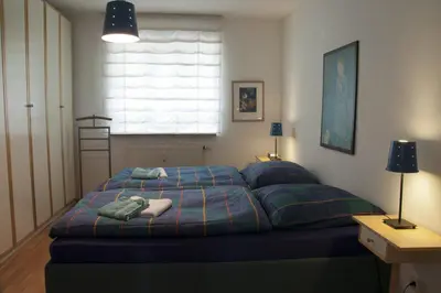 Ein Bett oder Betten in einem Zimmer der Unterkunft Ferienwohnung Henninger