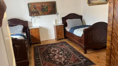 Ein Bett oder Betten in einem Zimmer der Unterkunft Rim Ferienwohnung in Lauchhammer mit Balkon