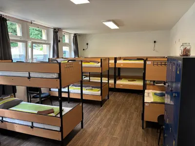 Ein Bett oder Betten in einem Zimmer der Unterkunft Alte Schule