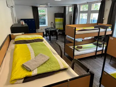 Ein Bett oder Betten in einem Zimmer der Unterkunft Alte Schule