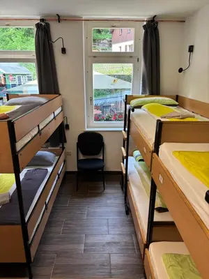 Ein Bett oder Betten in einem Zimmer der Unterkunft Alte Schule