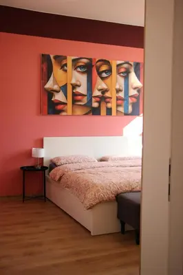 Ein Bett oder Betten in einem Zimmer der Unterkunft Kulturelles Businessapartment in Toplage