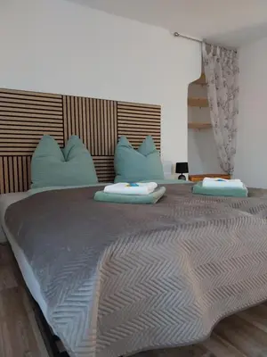Ein Bett oder Betten in einem Zimmer der Unterkunft Vorwerk Wehlen
