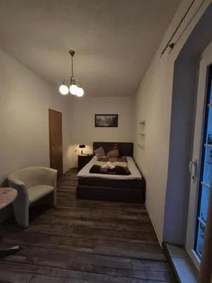 Ein Bett oder Betten in einem Zimmer der Unterkunft Historisches Erbgericht Neukirch Lausitz