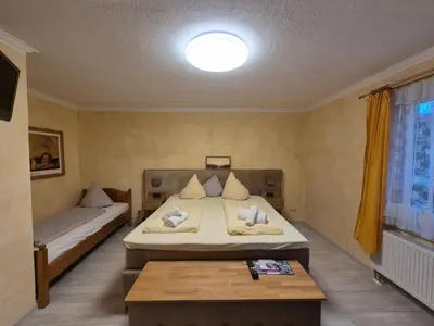 Ein Bett oder Betten in einem Zimmer der Unterkunft Historisches Erbgericht Neukirch Lausitz