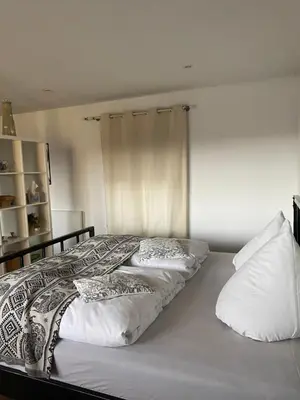 Ein Bett oder Betten in einem Zimmer der Unterkunft Ferienwohnung Seeblick