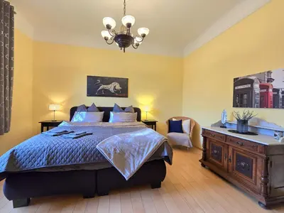 Ein Bett oder Betten in einem Zimmer der Unterkunft Ferienwohnung im Musikerviertel