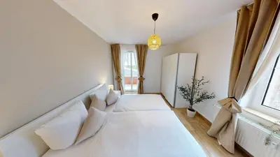 Ein Bett oder Betten in einem Zimmer der Unterkunft Retrochic in zentraler Lage, nur 1 Minute bis zur Haltestelle der Linie 5, WLAN