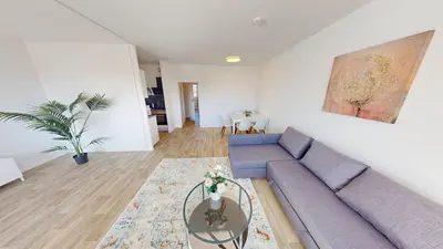 Ein Sitzbereich in der Unterkunft Großzügige Ferienwohnung, 350m bis zur Bushaltestelle, WLAN