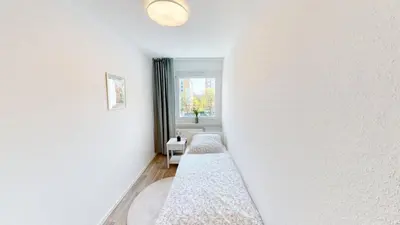 Ein Bett oder Betten in einem Zimmer der Unterkunft Wohnkomfort und Retro-Charme, ÖPNV fußläufig erreichbar, WLAN