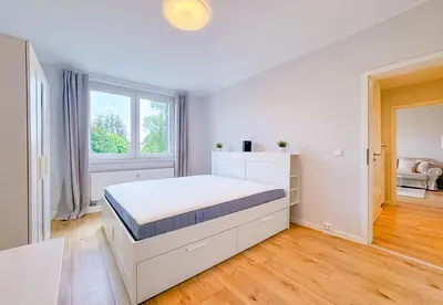 Ein Bett oder Betten in einem Zimmer der Unterkunft Geräumige Stilvolle Wohnung - Ihr perfektes Zuhause