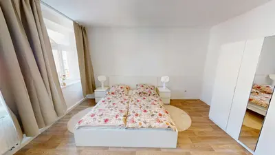 Ein Bett oder Betten in einem Zimmer der Unterkunft Ferienwohnung nahe Industriemuseum, WLAN