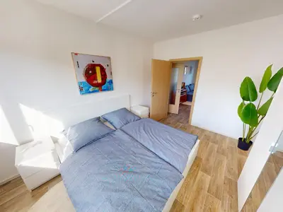 Ein Bett oder Betten in einem Zimmer der Unterkunft Vintage-Flair gemeinsam genießen, ÖPNV fußläufig erreichbar, WLAN