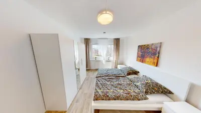Ein Bett oder Betten in einem Zimmer der Unterkunft Hier ist Platz für vier, nur 200m bis zur Haltestelle der Linie 5, WLAN