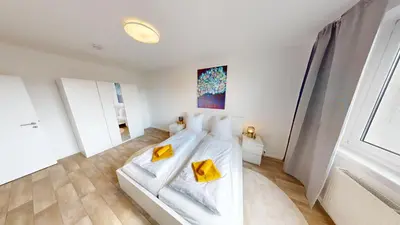 Ein Bett oder Betten in einem Zimmer der Unterkunft Ferienwohnung mit Weitblick, WLAN