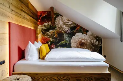 Ein Bett oder Betten in einem Zimmer der Unterkunft Historischer Gasthof Zum Anker Wachau