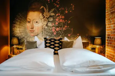 Ein Bett oder Betten in einem Zimmer der Unterkunft Historischer Gasthof Zum Anker Wachau