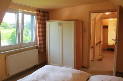 Ein Bett oder Betten in einem Zimmer der Unterkunft Ferienhof Leuner